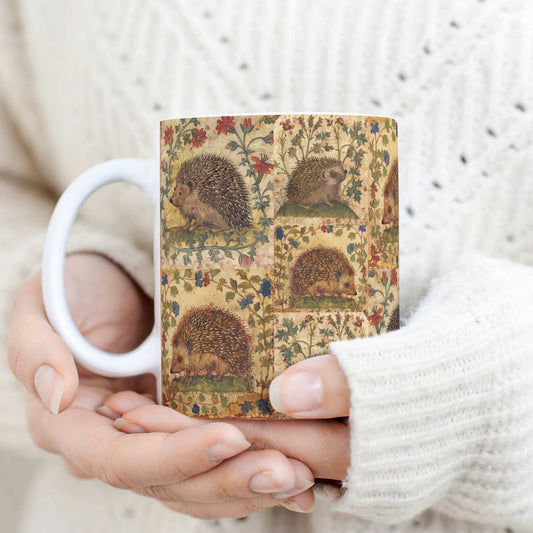 Detailed hedgehog-themed mug with vintage floral designs, styled in a medieval manuscript pattern,