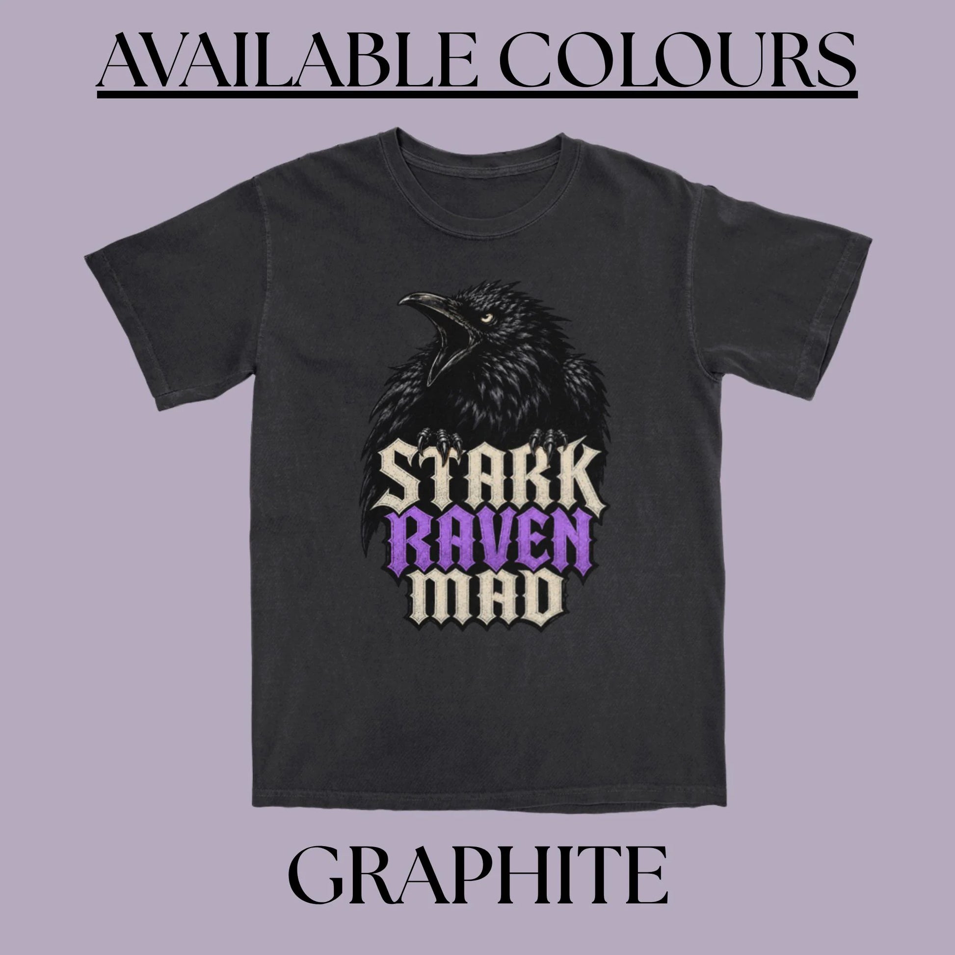 A dark gray t-shirt featuring a graphic of a raven with the text 'STARK RAVEN MAD' in cream and purple gothic lettering. The image is framed with the text 'AVAILABLE COLOURS' at the top and 'GRAPHHITE' at the bottom on a solid lavender background.
