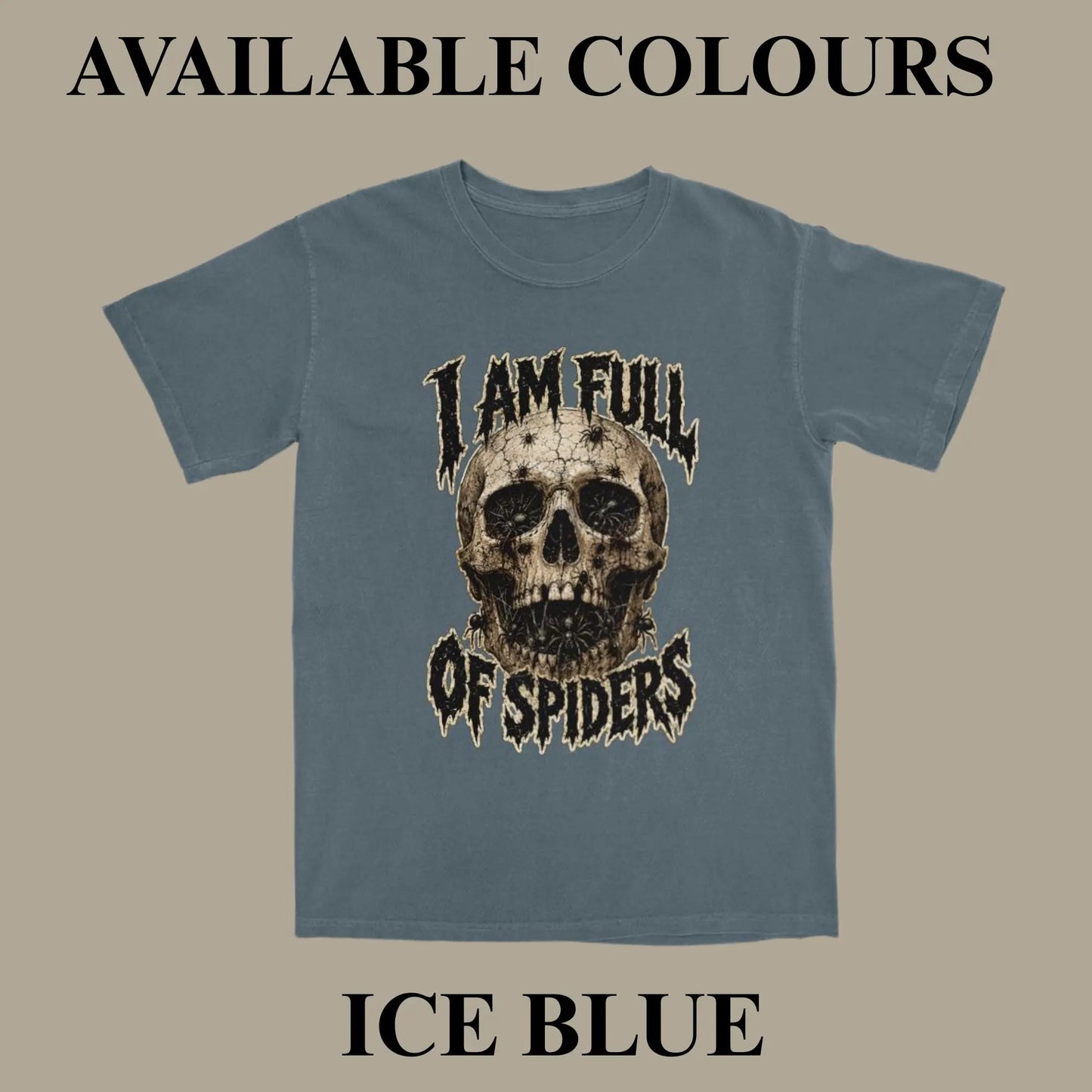 An ice blue t-shirt with a distressed graphic of a skull and the text 'I AM FULL OF SPIDERS' on a solid beige background, with text overlays reading 'AVAILABLE COLOURS' at the top and 'ICE BLUE' at the bottom.