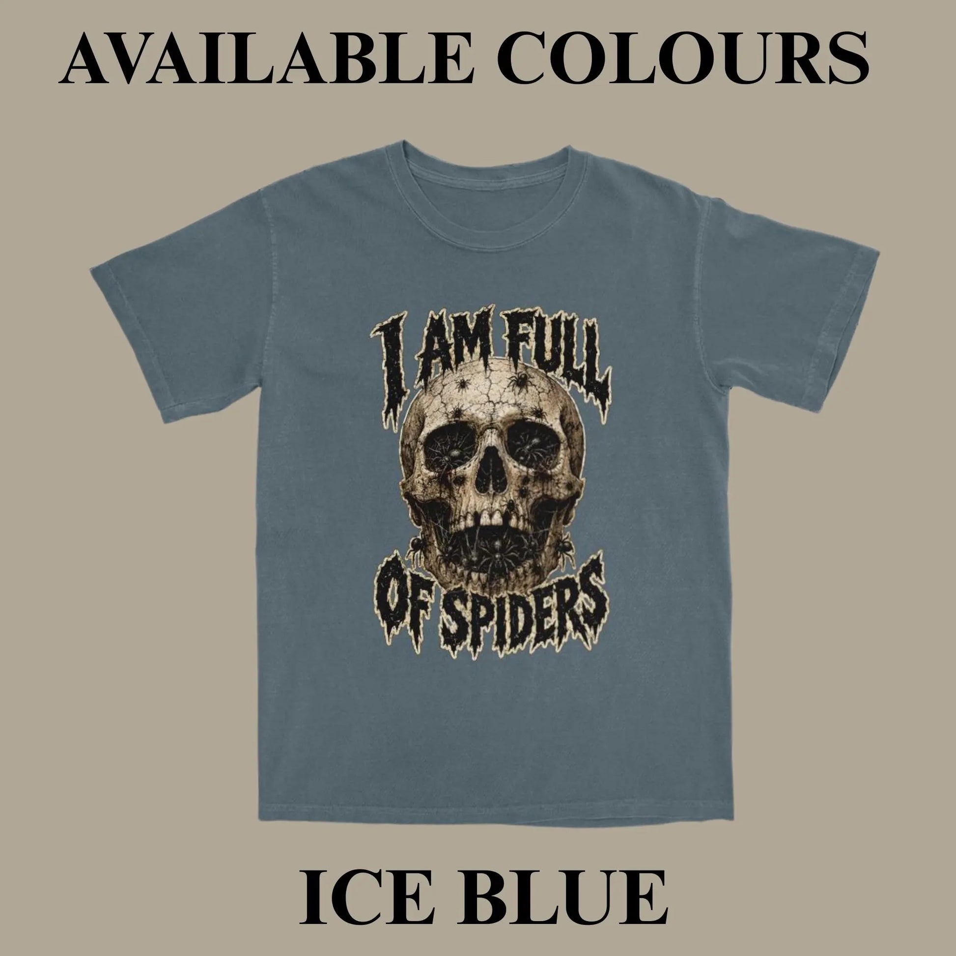 An ice blue t-shirt with a distressed graphic of a skull and the text 'I AM FULL OF SPIDERS' on a solid beige background, with text overlays reading 'AVAILABLE COLOURS' at the top and 'ICE BLUE' at the bottom.