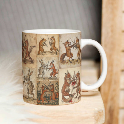 Medieval-inspired mug showing detailed illustrations of foxes and rabbits dueling with swords.