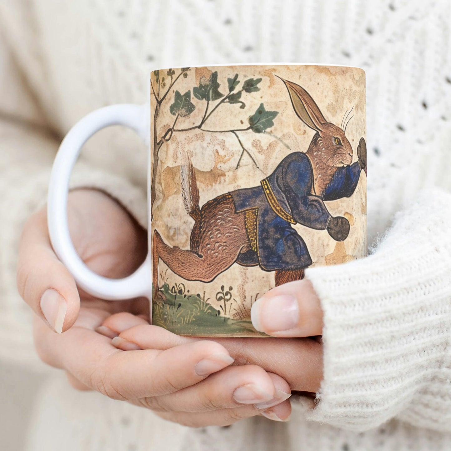 This unique March hare mug showcases a whimsical design with boxing hares in a primitive art style. The borderless illustration wraps around the entire mug, blending fantasy and medieval folklore, ideal for collectors and history enthusiasts.