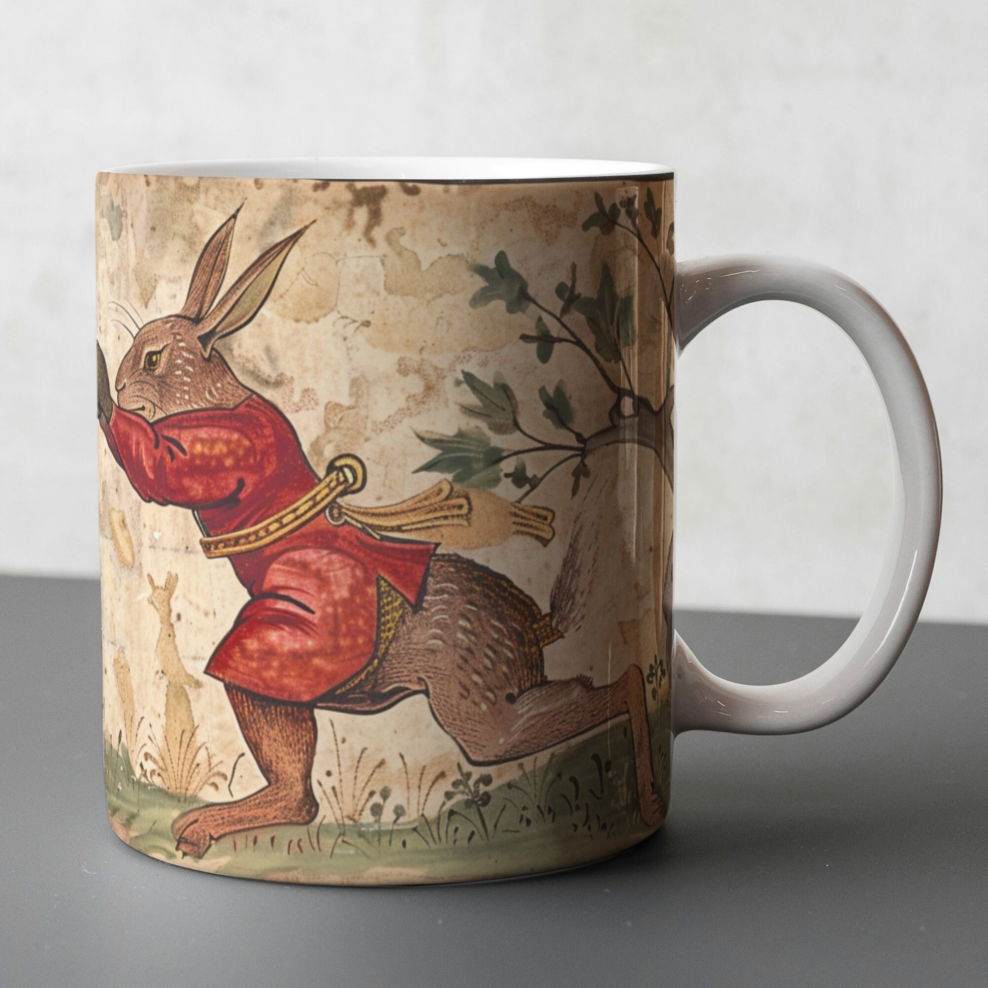 Featuring a full-wrap, borderless design, this hare-themed mug depicts boxing hares in an illuminated medieval art style. Perfect for history buffs, folklore enthusiasts, and those who appreciate quirky, fantasy-inspired drinkware.