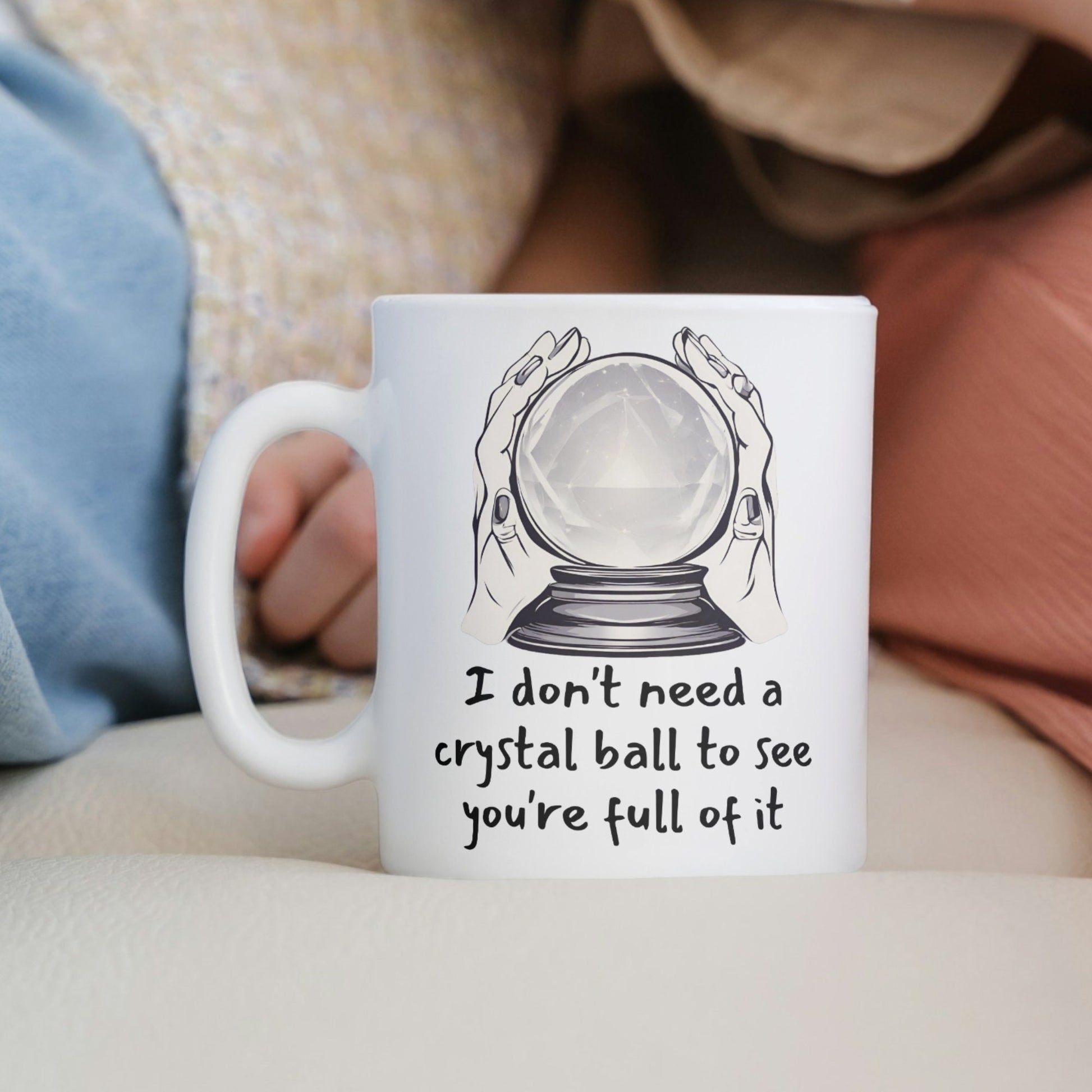 Swear mug with a polite twist, depicting a crystal ball and hands, ideal for workplace humour
