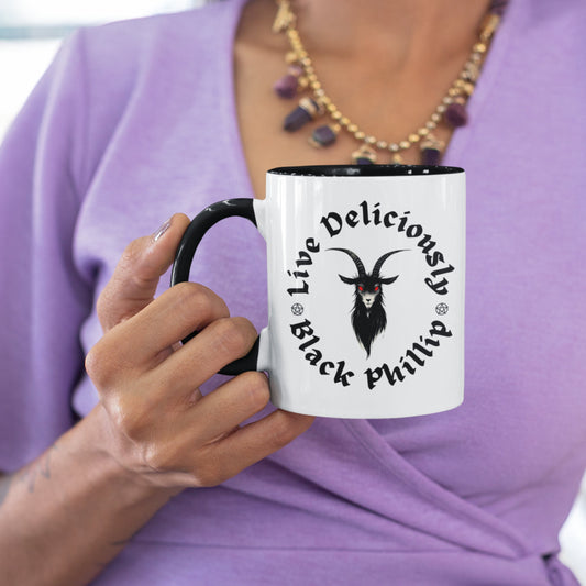 Black Phillip mug with &#39;Live Deliciously&#39; text and a goat design from the movie The Witch