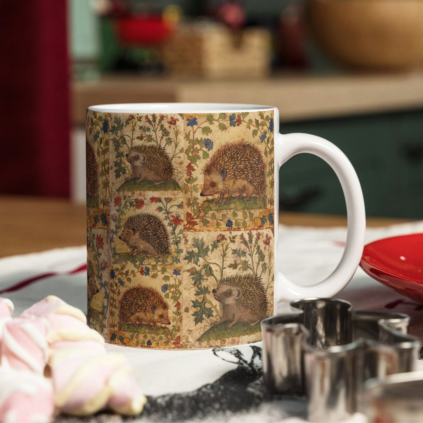Borderless, 11oz wraparound ceramic mug featuring different snuffly hedgehogs, intertwined with floral and fauna inspired by medieval manuscripts