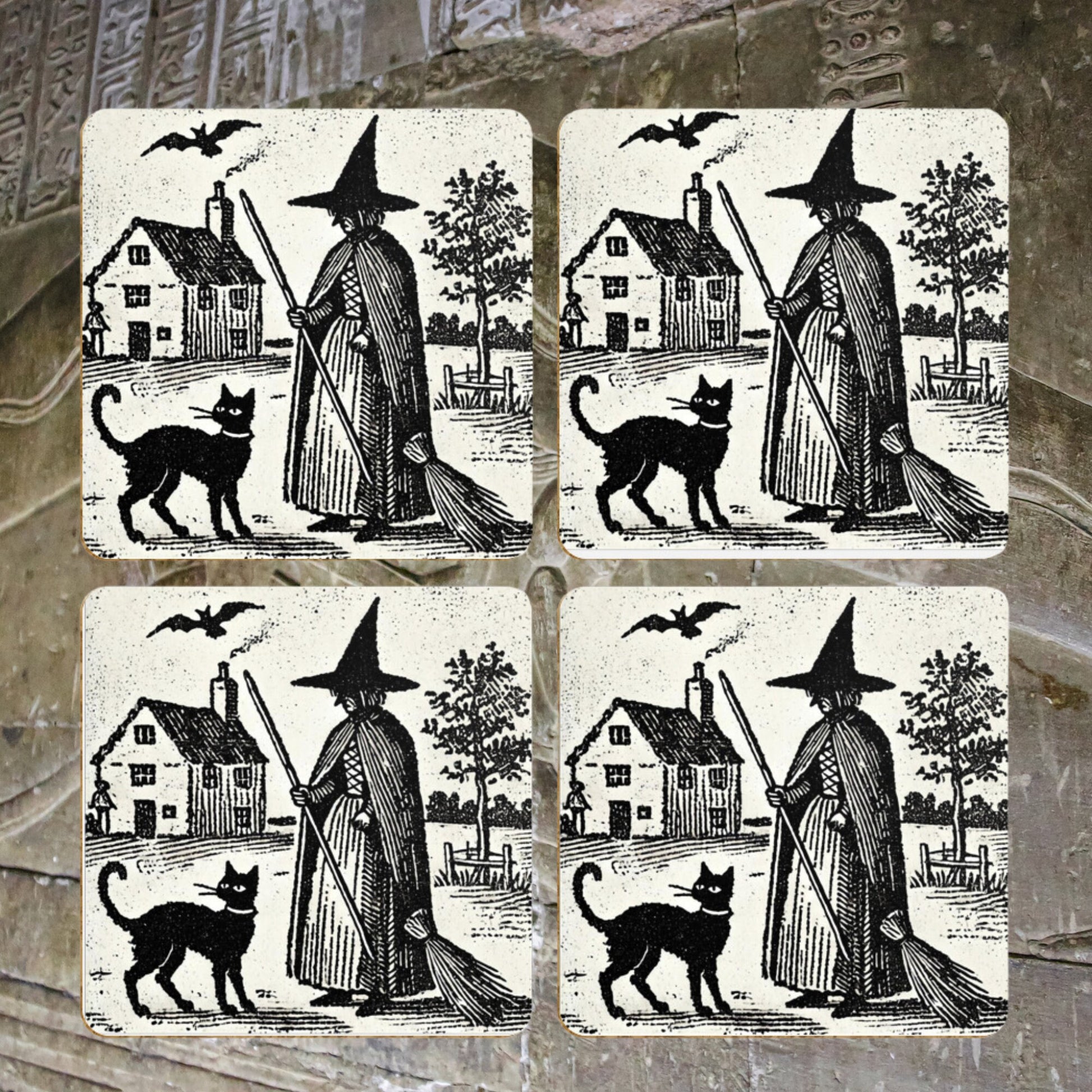 witchy gifts: woodcut of a witch with her familiar, a black cat printed on a cork backed, hardwood coaster. Witches house, home in the background with black cat wearing a collar.