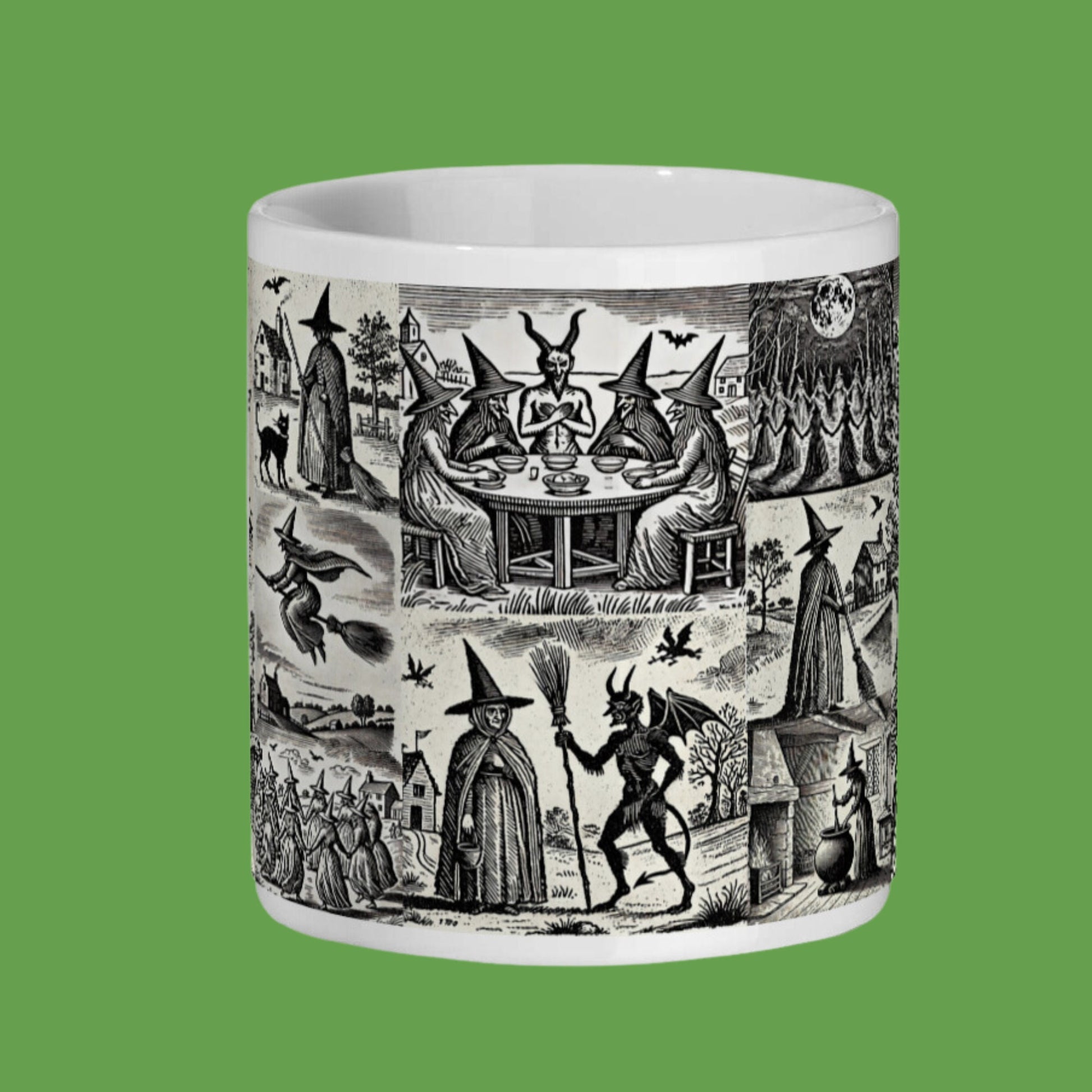 Gothic-themed mug with a black-and-white woodcut design of witches and the Devil, showcasing scenes of witchcraft and dark rituals