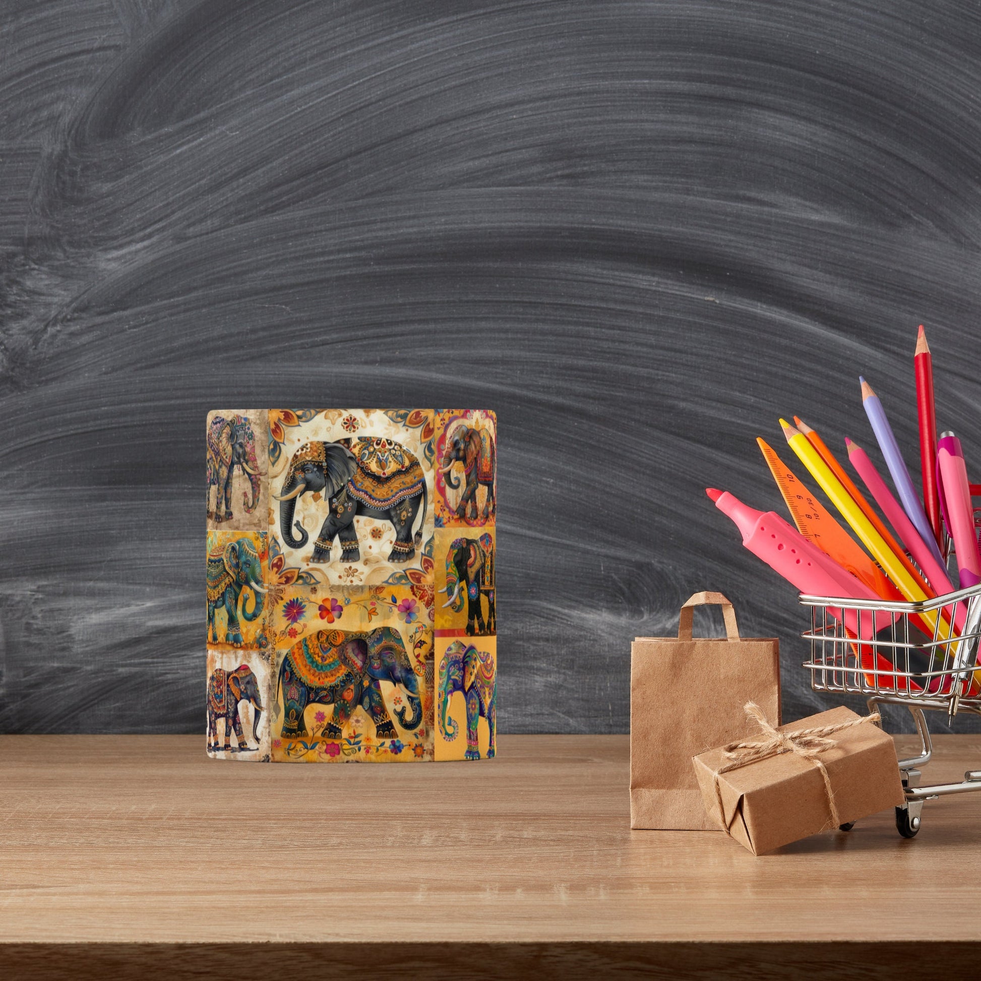 Mug featuring a collection of colourful elephants with detailed tribal and folk art patterns, great for an elephant lover’s gift.