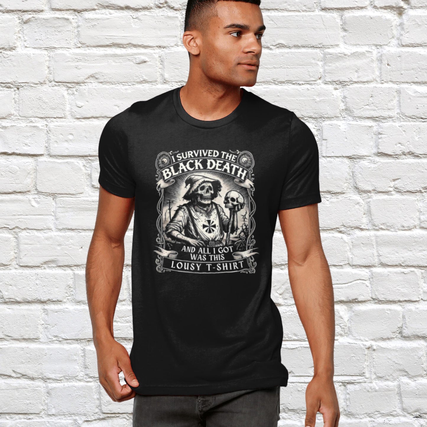 Black t-shirt with a medieval peasant in tattered clothes holding a shirt with a skull graphic and the slogan &quot;I Survived the Black Death and All I Got Was This Lousy Shirt.&quot; Dark humour, historical satire, gothic style, white print, vintage design