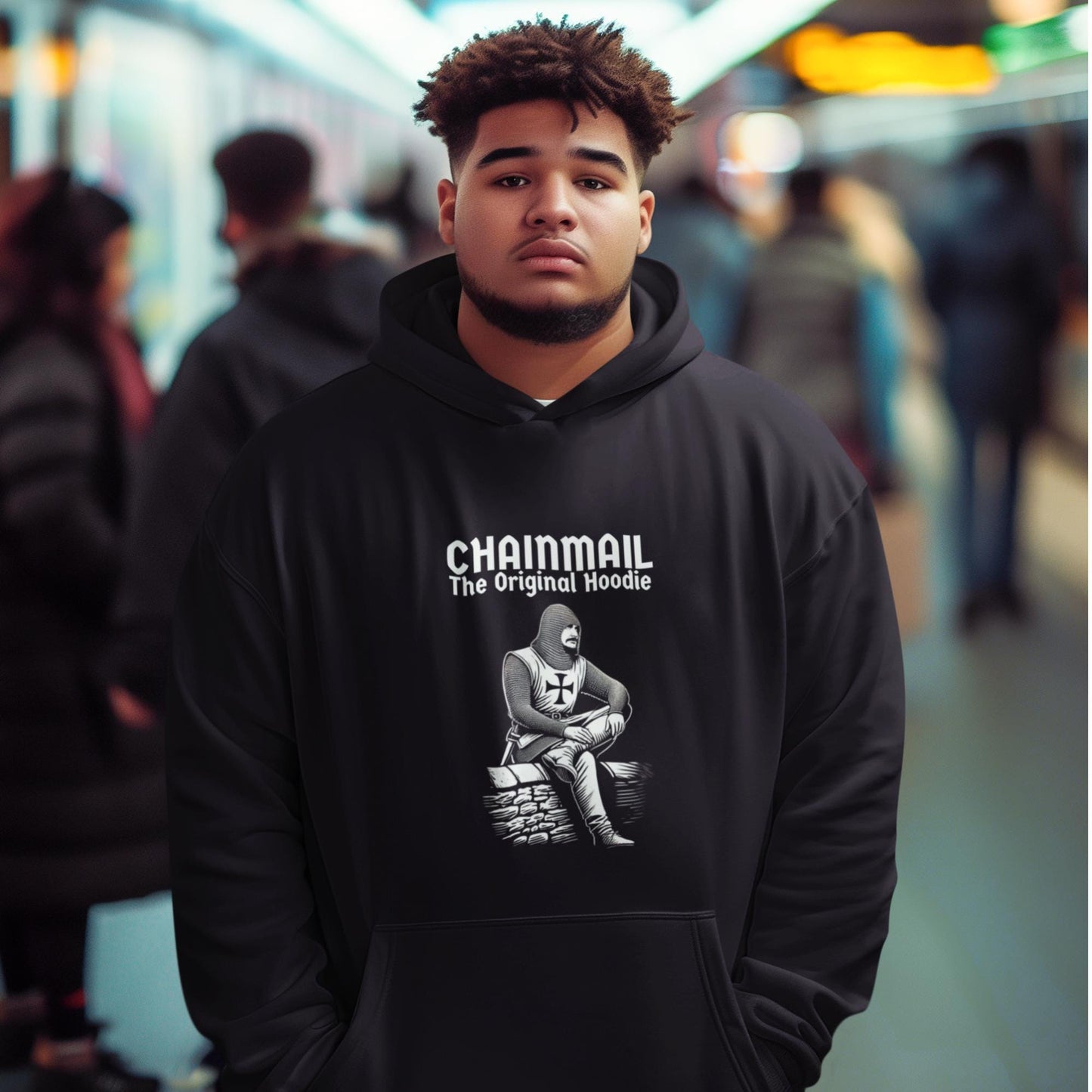 Black hoodie with a  medieval knight in chainmail armour. Slogan: Chainmail, the original hoodie. Sarcastic medieval humour. Medieval Warrior Hoodie. Perfect for medieval re-enactments. Marginalia, Middle ages apparel, knight costume, armour.