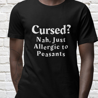 Black t-shirt with white medieval-style print: &quot;Cursed? Nah, just allergic to peasants.&quot; Perfect for fans of dark humour and medieval-inspired fashion. Witchy gift, medieval humour, Historic re-enactment. Sarcastic slogan. Black knight t-shirt