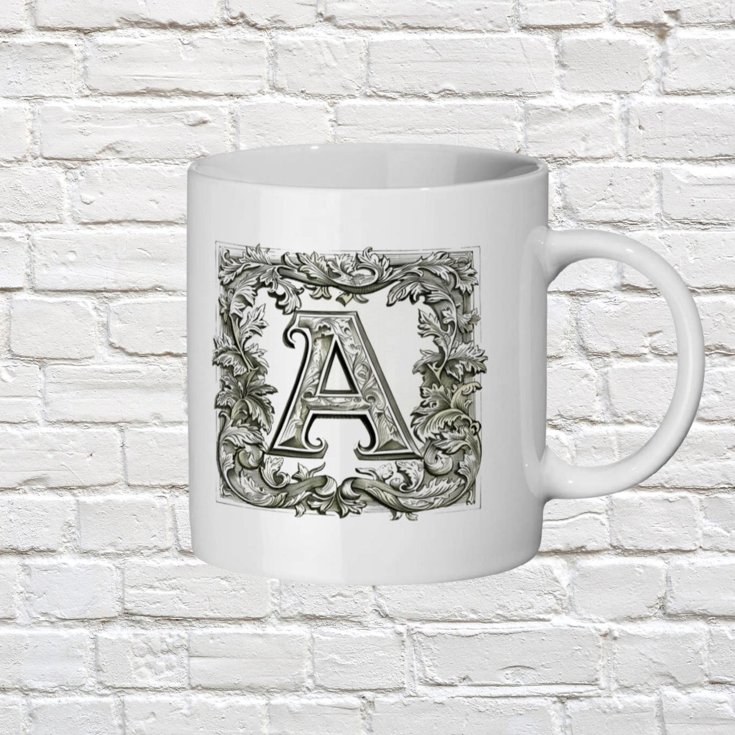 11 oz ceramic mug showcasing a stylized monogram with detailed flourishes, inspired by Renaissance-era illuminated lettering.