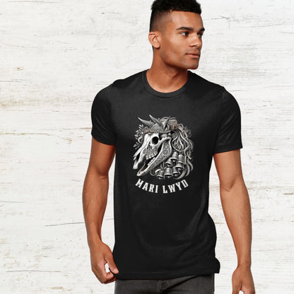 Detailed Mari Lwyd horse skull t-shirt design with festive bells and ribbons, inspired by Welsh folklore. The t shirt is available in black, teal, navy or forest green and sizes x small to 2 x large