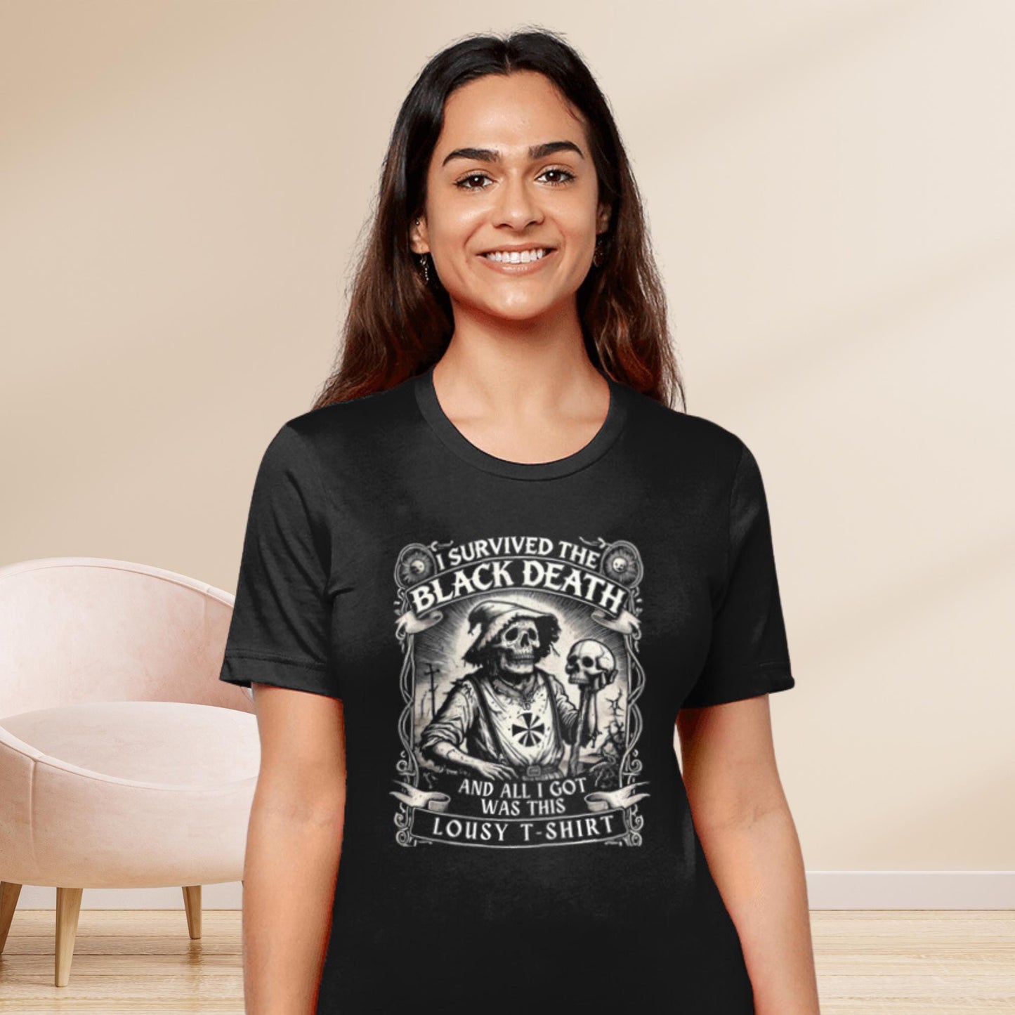 Black t-shirt with a white print featuring a medieval peasant in tattered clothes holding a shirt with a skull graphic. The slogan reads, &quot;I Survived the Black Death and All I Got Was This Lousy Shirt.&quot;