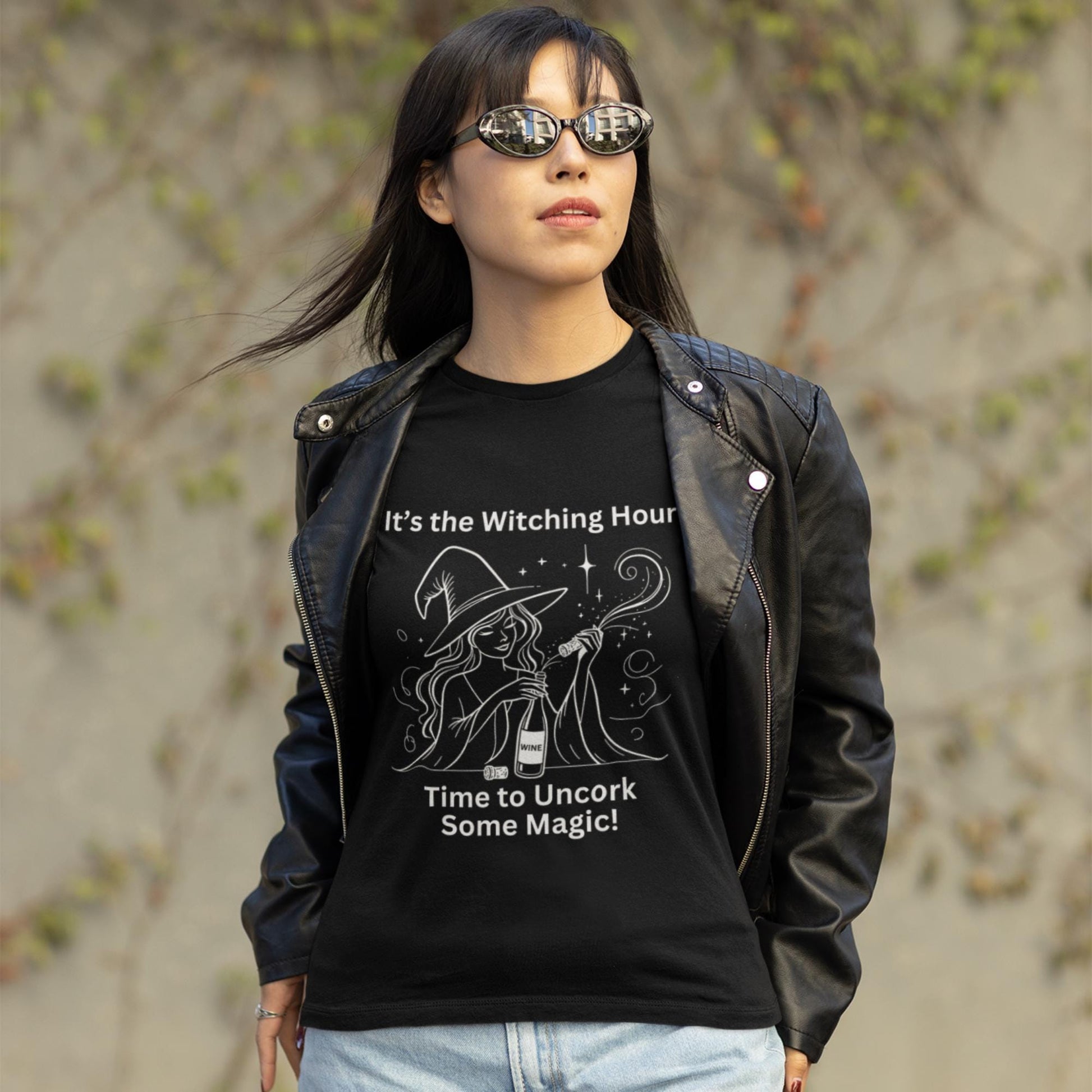 Fun and stylish black tee featuring a witch and wine bottle, designed for those who enjoy both magic and a good drink