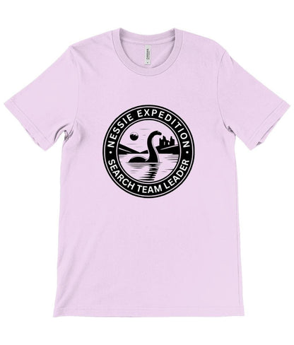 Search Team Leader Graphic Tee - A stylish graphic tee featuring the text &quot;Nessie Expedition Search Team Leader&quot; encircling an iconic depiction of Nessie in the Loch Ness waters.