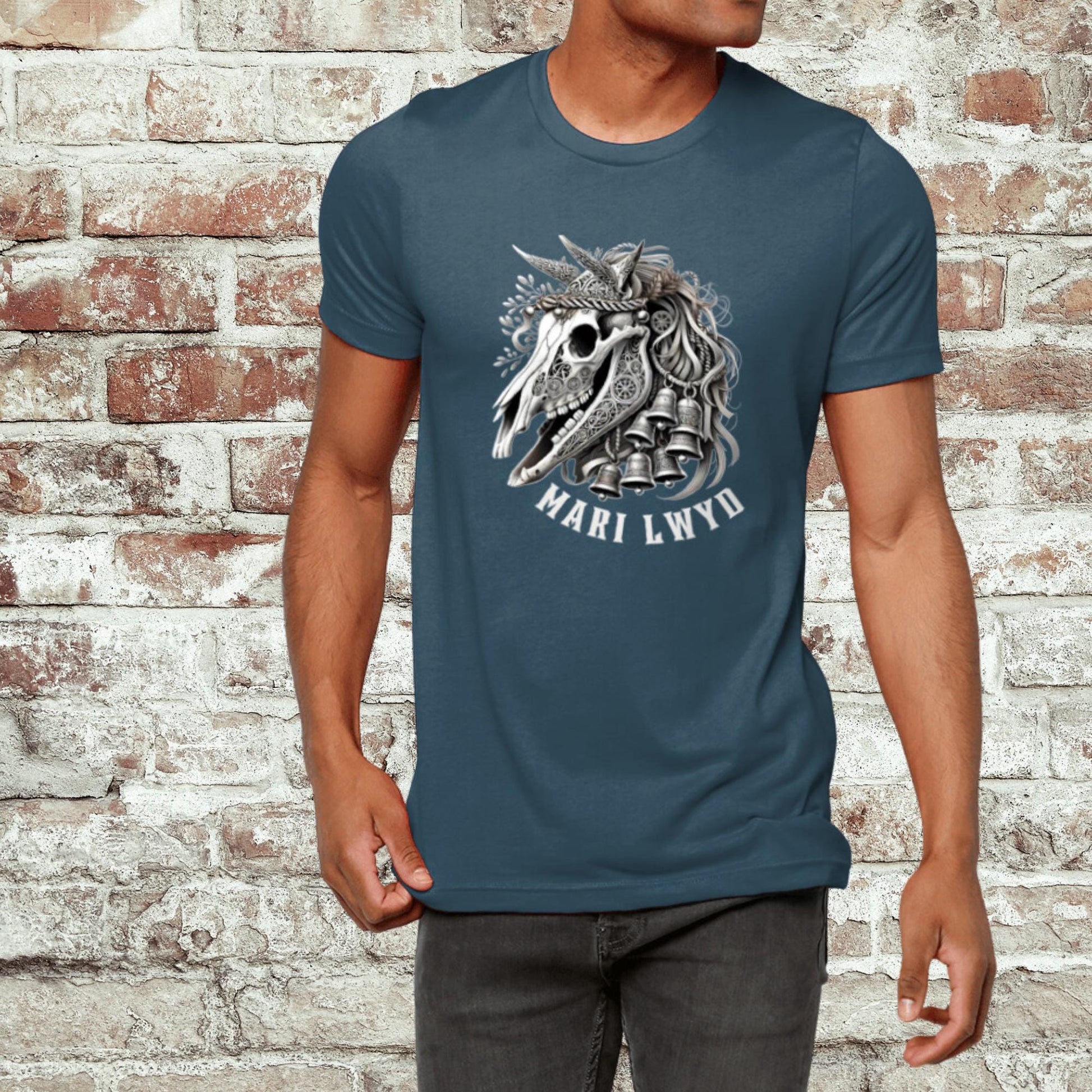 Detailed Mari Lwyd horse skull t-shirt design with festive bells and ribbons, inspired by Welsh folklore. The t shirt is available in black, teal, navy or forest green and sizes x small to 2 x large