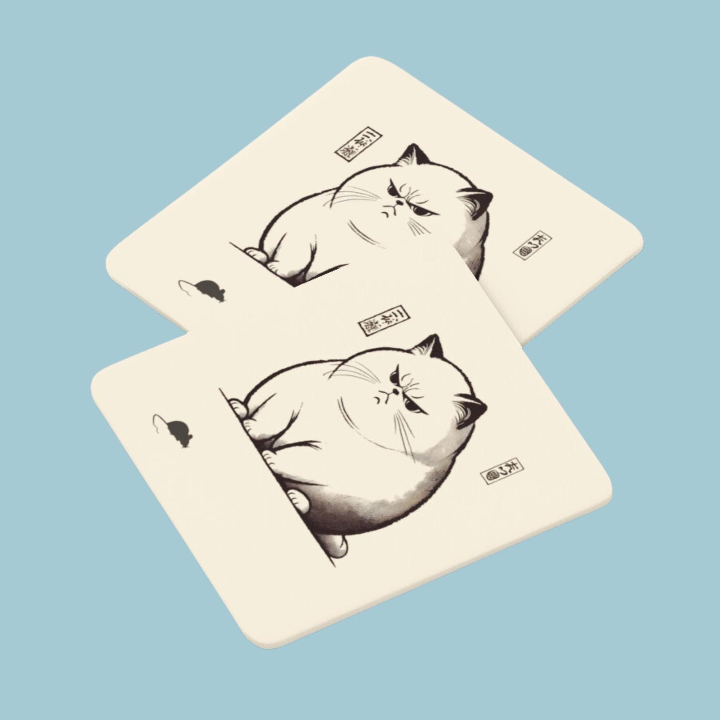 Four matching coasters showing an angry cat staring at a mouse, designed in a monochrome Japanese woodblock print style with subtle details.