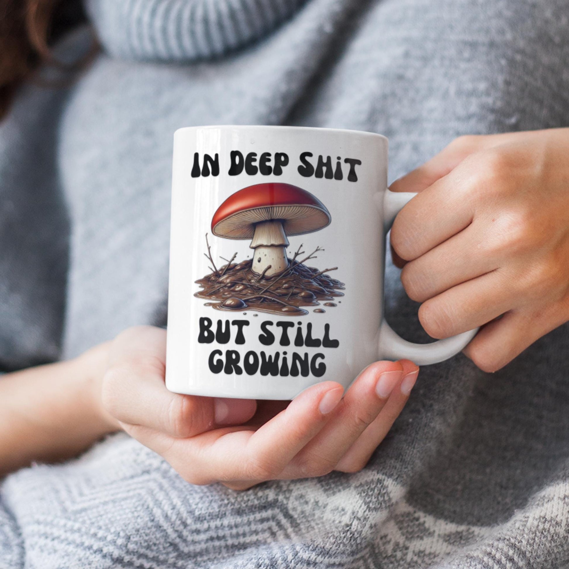 Nature-inspired coffee mug with a cute mushroom illustration and a humorous message about overcoming obstacles