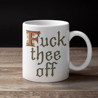 Medieval-inspired 11oz ceramic mug with ornate lettering spelling &#39;F*** Thee Off,&#39; a fun gift for the office