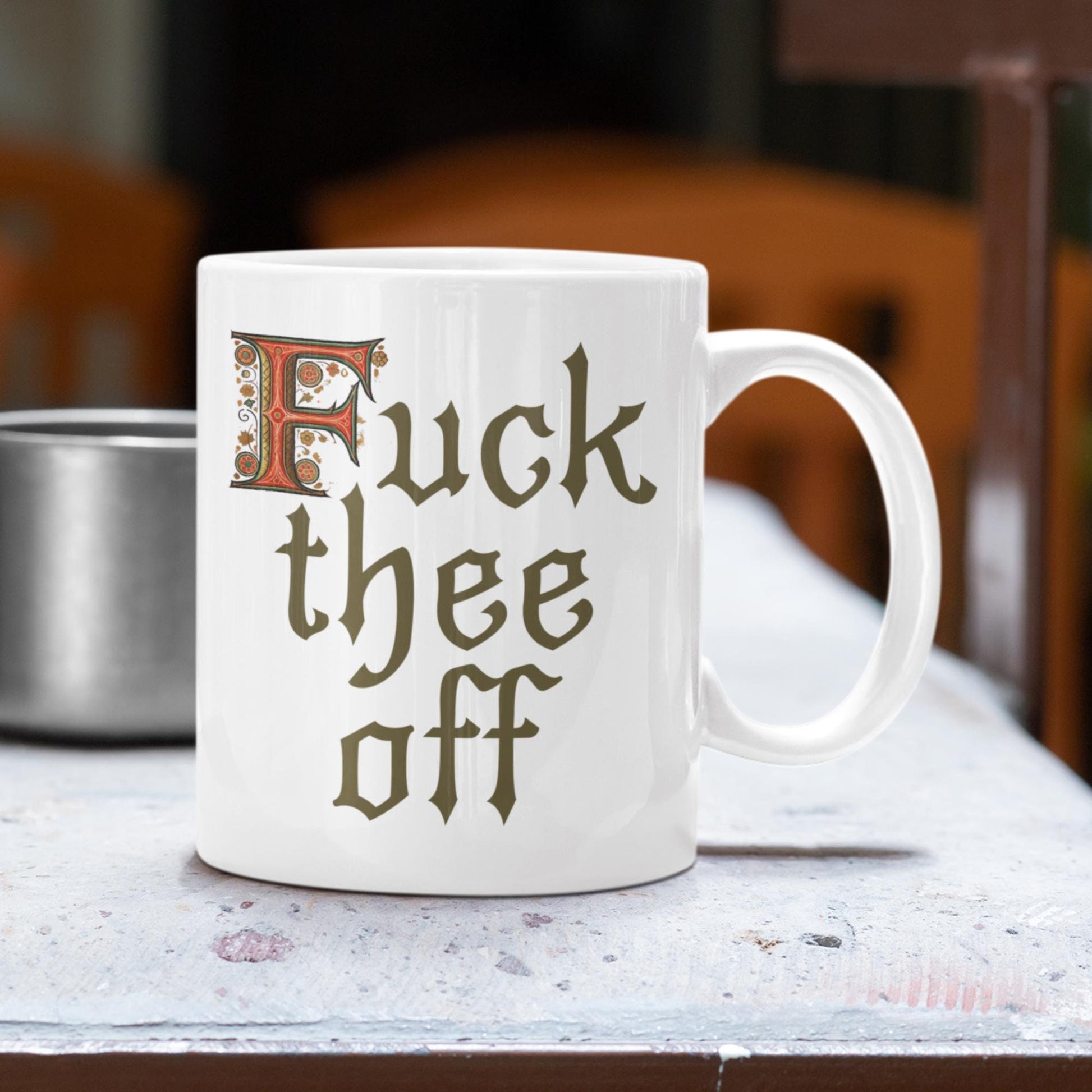 Sassy 11oz mug featuring medieval-style illuminated letter &#39;F&#39; and the phrase &#39;F*** Thee Off,&#39; great for office banter