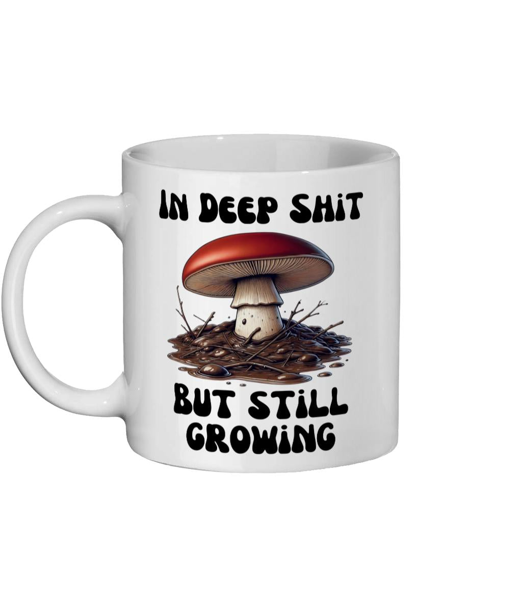 Ceramic mug with mushroom illustration and a motivational message about growth in tough times