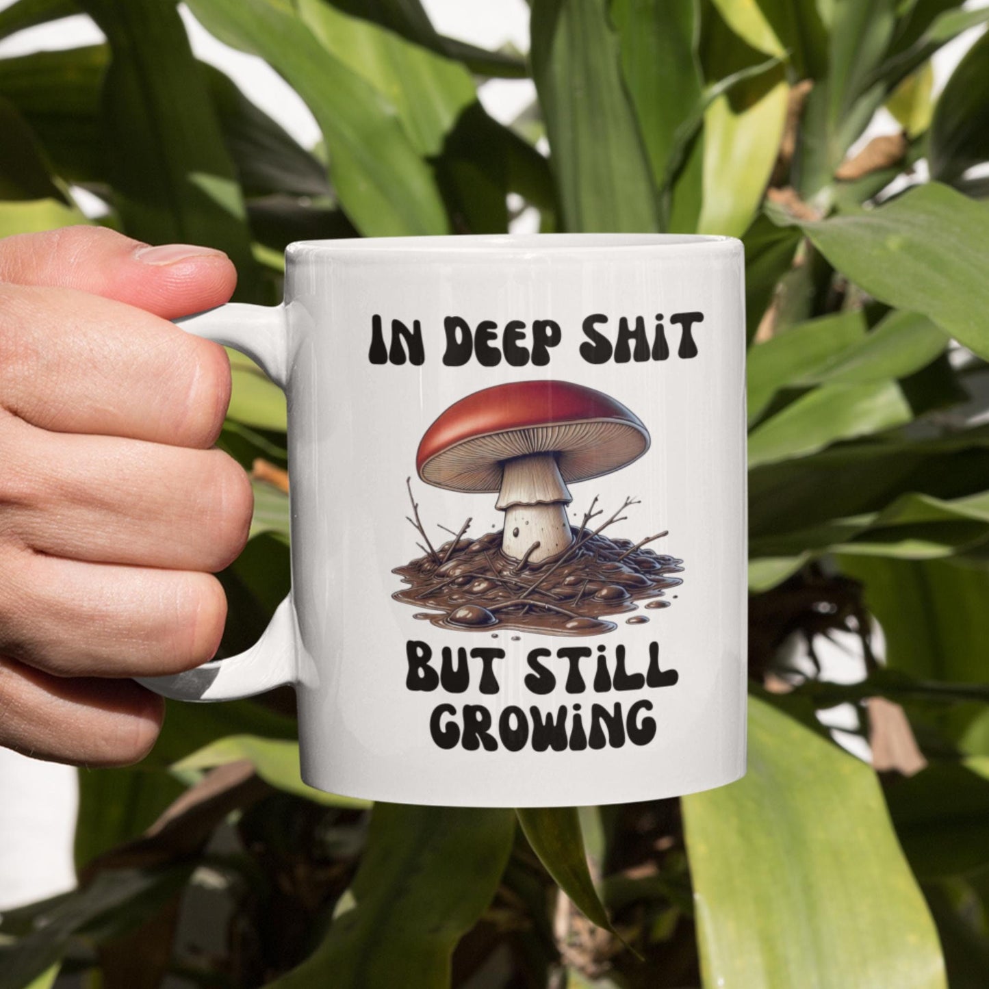 Funny mushroom mug with the quote &#39;In Deep Sh*t, But Still Growing&#39; featuring a cute mushroom illustration