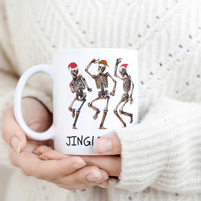 Festive 11 oz mug with dancing skeletons in Santa hats and Jingle Bones text