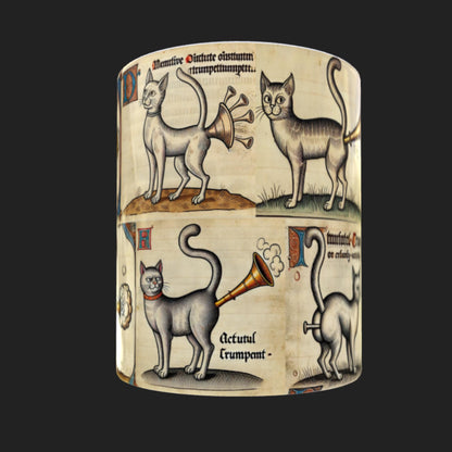 Unique cat lover gift mug with a humorous wrap-around medieval manuscript design of cheeky cats with trumpet tails. A great addition to any coffee lover’s collection.