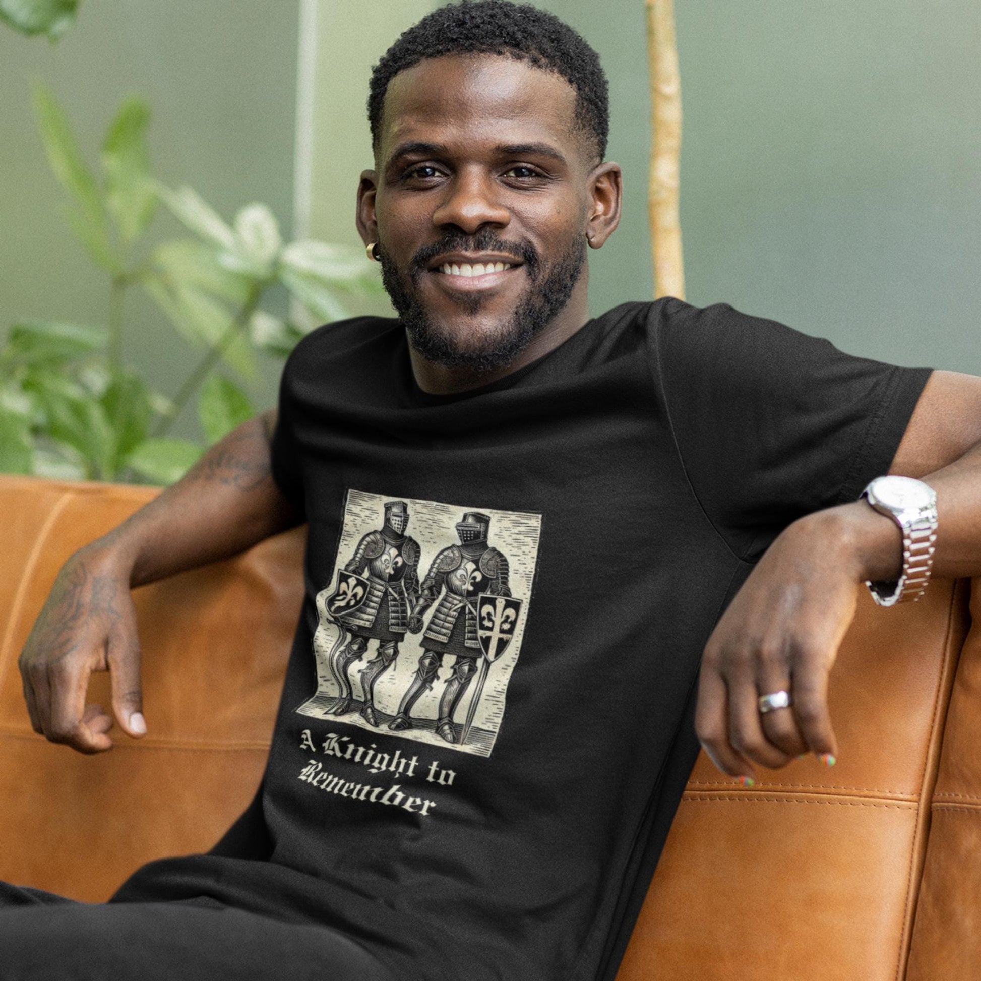 Chivalry meets LGBTQ+ pride on this black tee, featuring a historical-style illustration of two knights in love, captioned &#39;A Knight to Remember&#39;.