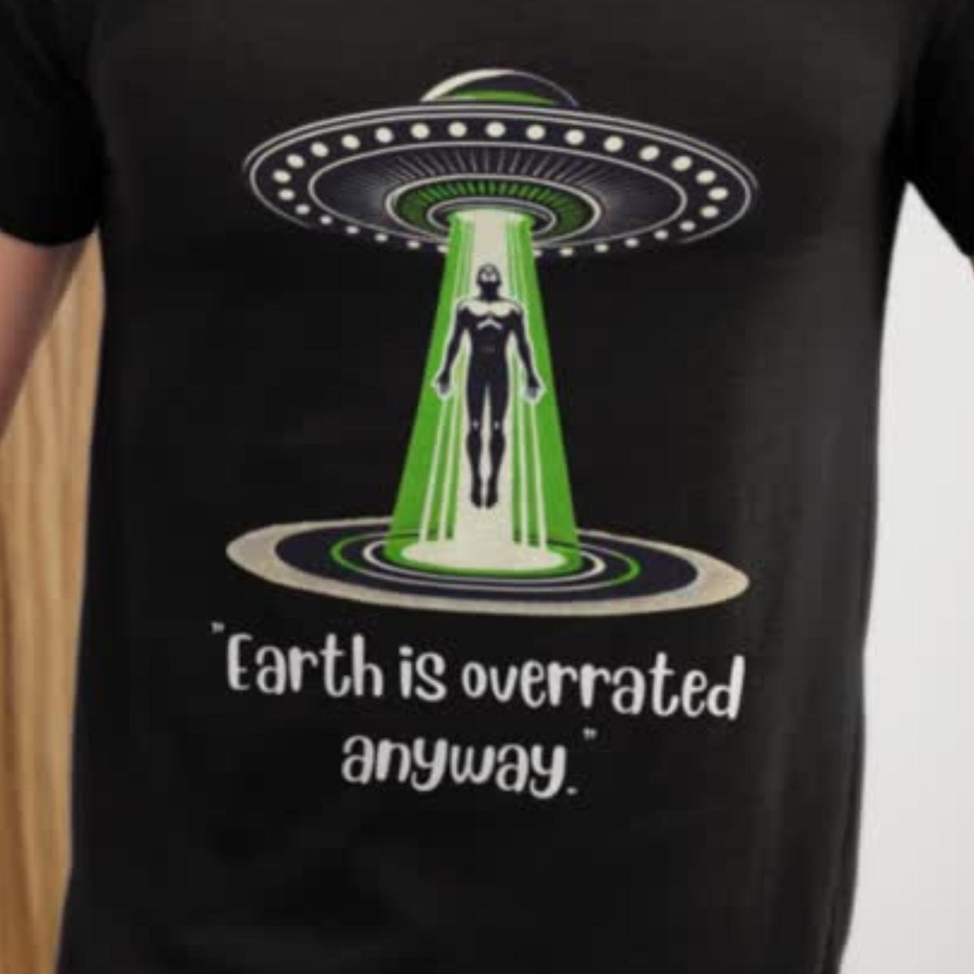 Extraterrestrial humor t-shirt, quirky sci-fi clothing, funny alien design
UFO-themed gift shirt, cosmic alien lover tee, funny extra-terrestrial graphic