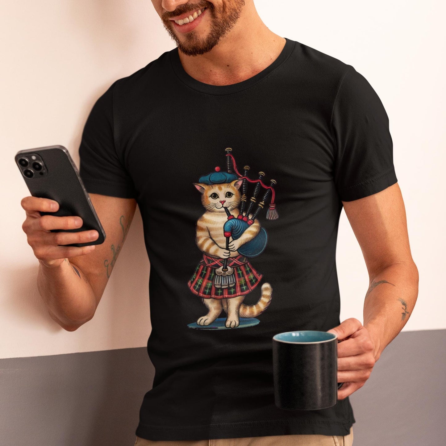 Funny Scottish bagpiper cat graphic tee, great for music lovers, Scotland fans, and medieval art enthusiasts.
