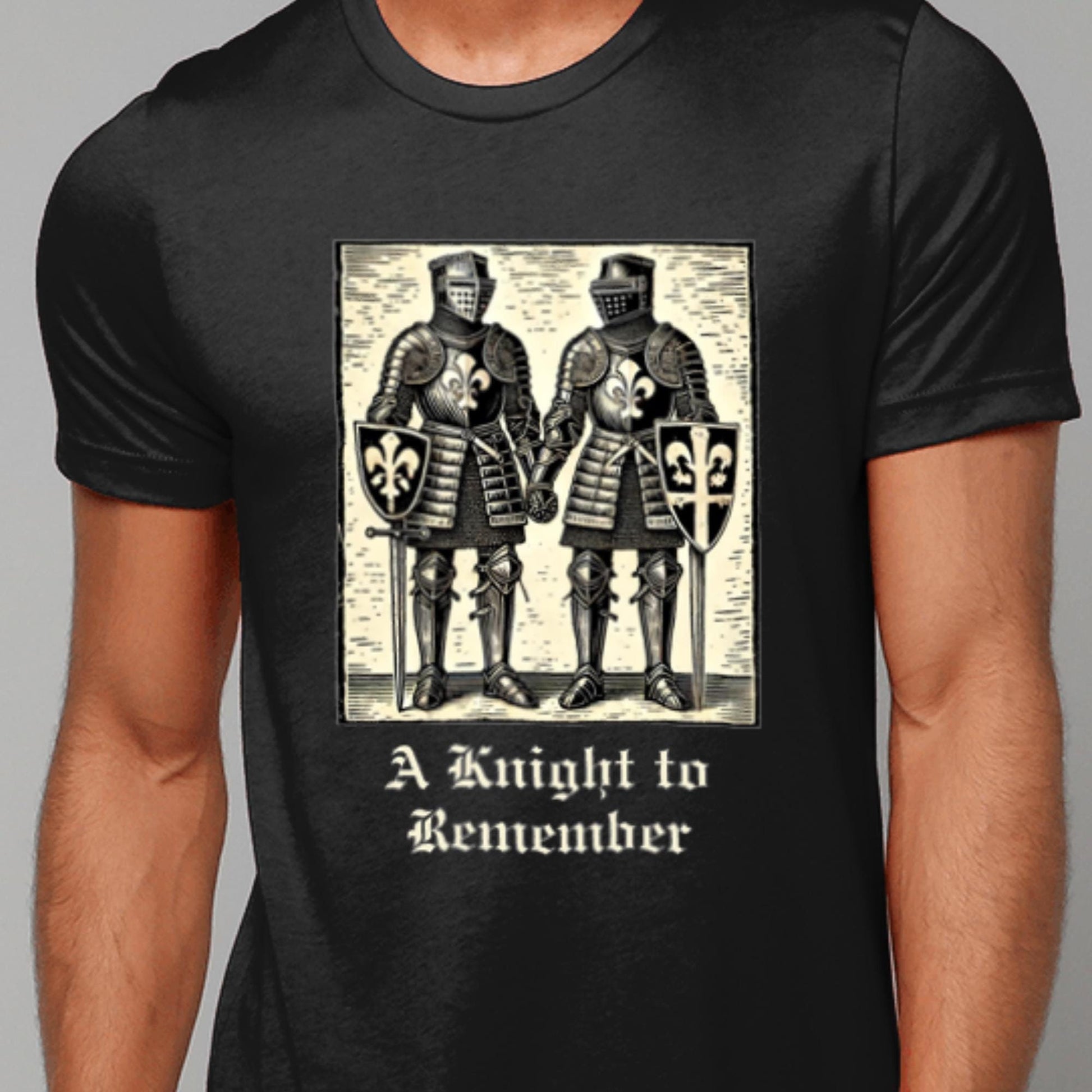 Black T-shirt featuring a medieval woodcut-style illustration of two knights in full armour holding hands, with the phrase &#39;A Knight to Remember&#39; in gothic script below