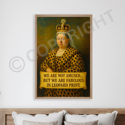 White frame Queen Victoria art print in leopard print outfit styled in a bright, modern interior.