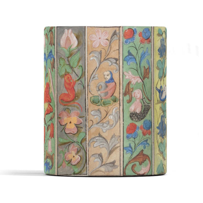 11oz mug with historic manuscript-inspired floral and creature designs.
