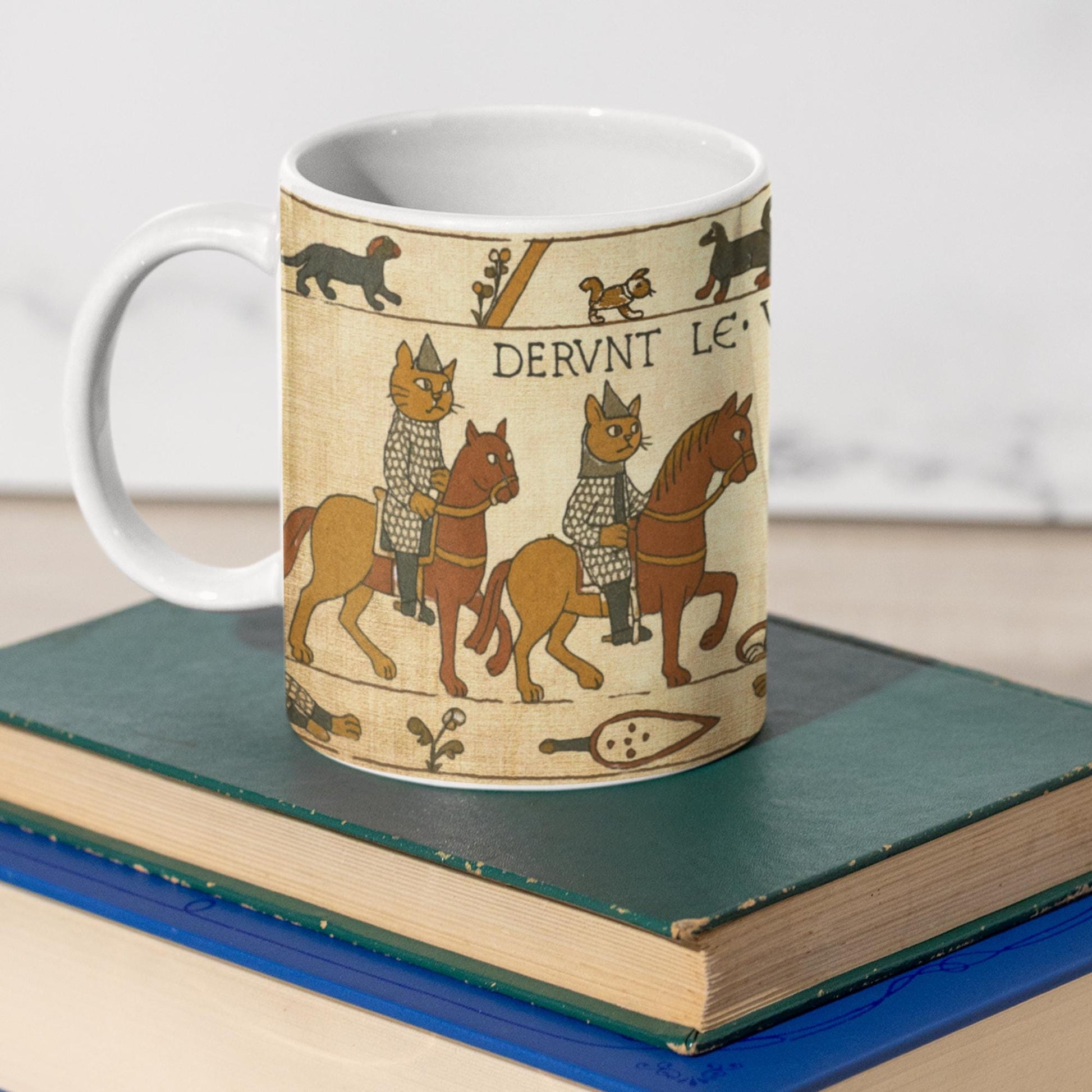 Wraparound medieval cats artwork with shields and bows on white tea mug for cat lovers