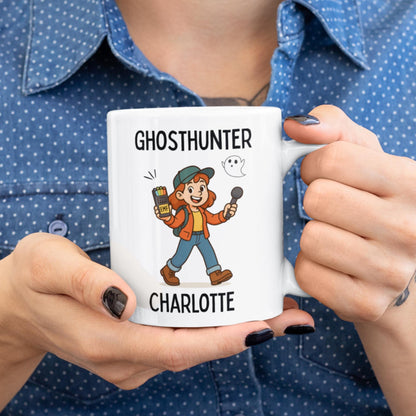 Woman holding a personalised ghosthunter mug with cartoon character design