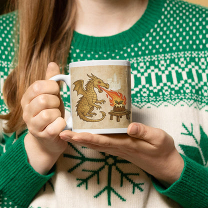 Medieval dragon breathing fire onto a flaming Christmas pudding mug