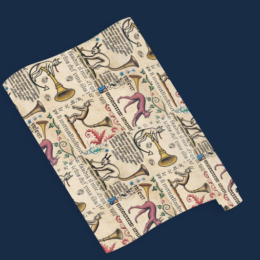 Medieval trumpet demon wrapping paper in illuminated manuscript style, printed as premium art gift wrap roll.